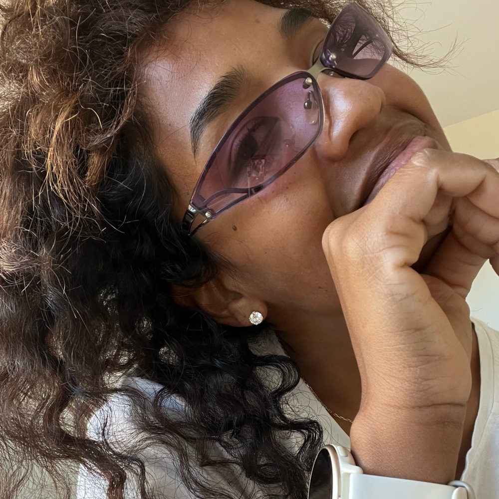 Stylish White Smartwatch with Purple Sunglasses